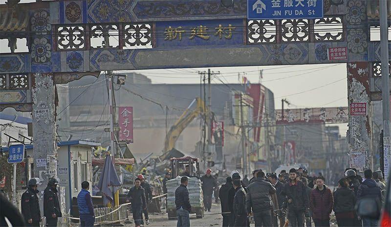 철거 중인 신지엔촌 ⓒSCMP
